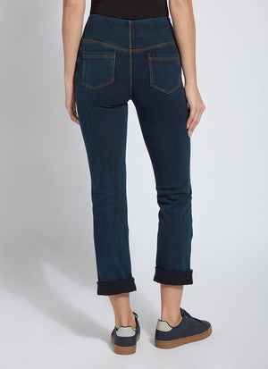 color=Indigo, Rear view of indigo,  4-way stretch, relaxed boyfriend denim jean legging, seen from waist down