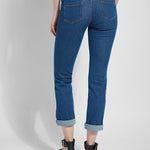 color=Mid Wash, back view, plus size boyfriend cut denim leggings with comfort waistband to smooth and slim 