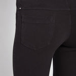 color=Black, Rear detail view of black  toothpick denim jean leggings with patented concealed waistband