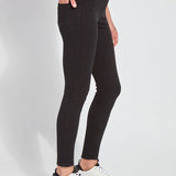 color=Black, Side view of black toothpick denim jean leggings with patented concealed waistband, seen from waist down