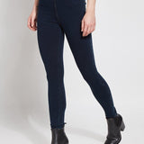 color=Indigo, Angled front view of indigo  toothpick denim jean leggings with patented concealed waistband, seen from waist down