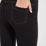 color=Midtown Black, Rear detail view of midtown black,  toothpick denim jean leggings with patented concealed waistband