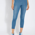 color=Mid Wash, summer denim jegging with scalloped hemline. Cropped, slim legging with comfort waistband