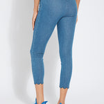 color=Mid Wash, back view, comfortable summer denim jegging with scalloped hemline. Cropped, slim legging with comfort waistband