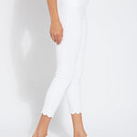 color=White, side view, comfortable summer denim jegging with scalloped hemline. Cropped, slim legging with comfort waistband