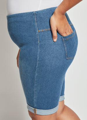 color=Mid Wash, side view, biker-length women's denim short, comfort waistband, flattering plus size cut