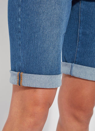 color=Mid Wash, hem detail, women's denim jean short, smoothing comfort waistband, body hugging in hips and looser across thigh