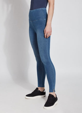 color=Mid Wash, front angle, plus size denim skinny jean leggings with concealed smoothing waistband for flattering fit