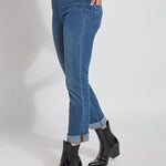 color=Mid Wash, angled front view, plus size boyfriend cut denim leggings with comfort waistband to smooth and slim 